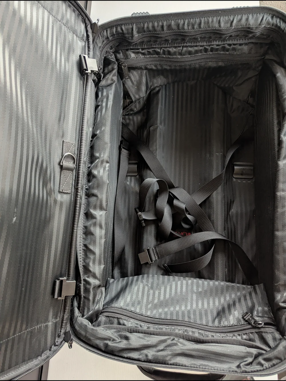 Tumi Black Men’s Carry-On Rolling Travel Bag